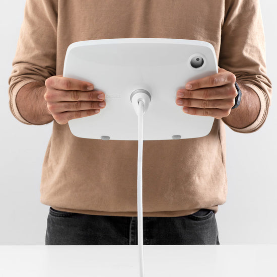 Bouncepad Lounge - A tethered tablet and iPad enclosure in white.