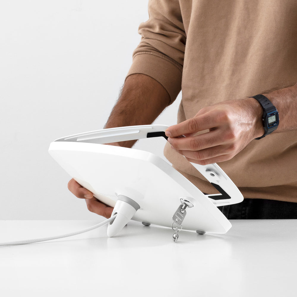 Bouncepad Lounge - A tethered tablet and iPad enclosure in white.