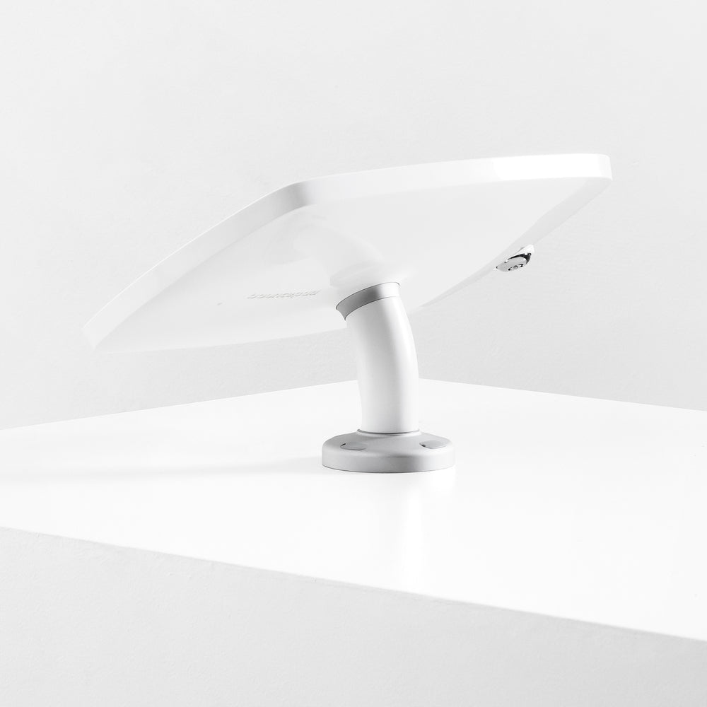 Bouncepad Swivel Desk - A secure rotating tablet & iPad desk mount in white.
